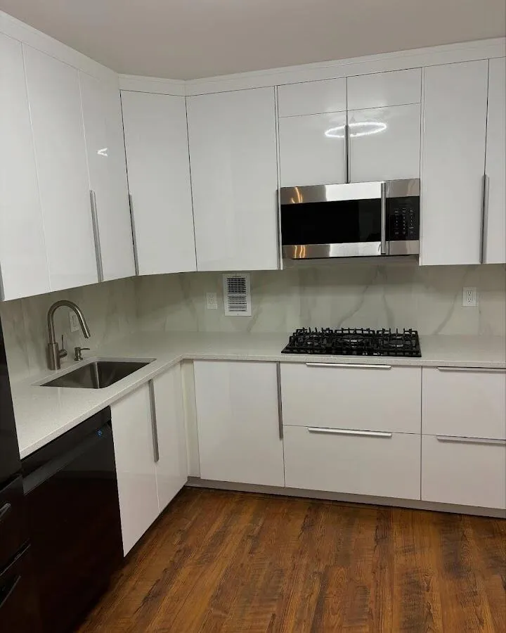 Restored kitchen with white cabinets after water damage in Weslaco